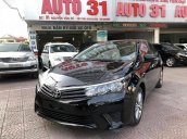 Cần bán xe Toyota Corolla Altis 1.8G MT sản xuất năm 2014, màu đen giá cạnh tranh