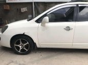 Cần bán xe Kia Carens 1.6MT đời 2010, màu trắng, 260 triệu