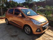 Cần bán gấp Hyundai Grand i10 sản xuất năm 2016, màu vàng, xe nhập