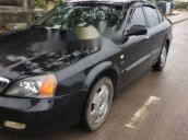 Cần bán gấp Daewoo Magnus đời 2004, màu đen, giá chỉ 145 triệu