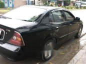 Cần bán gấp Daewoo Magnus đời 2004, màu đen, giá chỉ 145 triệu