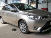 Bán Toyota Vios E 1.5MT màu vàng cát, số sàn, biển Sài Gòn sản xuất 2016 mẫu mới