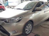 Bán Toyota Vios E 1.5MT màu vàng cát, số sàn, biển Sài Gòn sản xuất 2016 mẫu mới