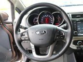 Cần bán xe Kia Rio 1.4AT sản xuất 2015, màu nâu, nhập khẩu, giá tốt