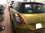 Bán Suzuki Swift RS 2017, màu vàng, đúng chất xe lướt, giá TL, hỗ trợ góp