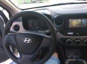 Cần bán xe Hyundai i10 2015 sedan số sàn, màu trắng zin