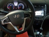 Cần bán Hyundai Accent sản xuất 2014, màu vàng, nhập khẩu