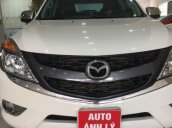 Bán Mazda BT50 2.2AT đăng ký tháng 11/2015, màu trắng, số tự động, còn mới 99%