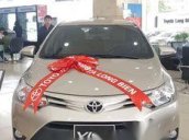 Bán xe Toyota Vios 1.5E đời 2018, màu ghi vàng 