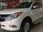 Bán Mazda BT50 2.2AT đăng ký tháng 11/2015, màu trắng, số tự động, còn mới 99%