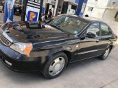 Cần bán lại xe Daewoo Magnus sản xuất năm 2005, màu đen đẹp như mới