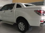 Bán Mazda BT50 2.2AT đăng ký tháng 11/2015, màu trắng, số tự động, còn mới 99%