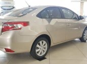 Bán xe Toyota Vios 1.5E đời 2018, màu ghi vàng 