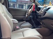 Cần bán Fortuner 2010, số sàn, máy dầu, màu đen