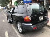 Cần bán gấp Hyundai Santa Fe Gold sản xuất 2004, màu đen