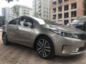 Bán xe Kia Cerato năm 2016, màu vàng cát