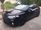 Cần bán lại xe Kia Forte 2010, màu đen