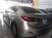 Bán xe Mazda 3 đời 2015, màu vàng cát