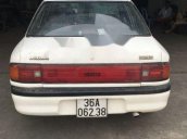 Cần bán gấp Mazda 323 năm sản xuất 1995, màu trắng, nhập khẩu nguyên chiếc