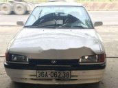 Cần bán gấp Mazda 323 năm sản xuất 1995, màu trắng, nhập khẩu nguyên chiếc