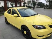 Bán Mazda 3 AT đời 2005, màu vàng số tự động