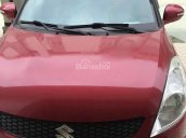 Cần bán xe Suzuki Swift đời 2014, màu đỏ xe gia đình