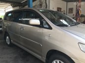 Cần bán lại chiếc Toyota Innova E sản xuất 08/2012, màu nâu vàng