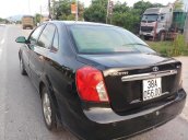 Cần bán lại xe Daewoo Lacetti 1.8 MAX năm 2004, màu đen, xe nhập giá cạnh tranh