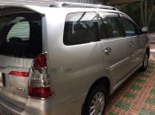 Bán xe Toyota Innova 2.0 E ĐK 2014, màu bạc 