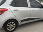 Cần bán xe Hyundai Grand i10 AT năm 2015, màu bạc 