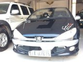 Cần bán Peugeot 206 đời 2006, màu đen, đăng ký lần đầu 2009