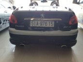 Cần bán Peugeot 206 đời 2006, màu đen, đăng ký lần đầu 2009