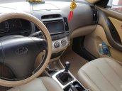 Cần bán xe Elantra 1.6 MT 2009, màu trắng