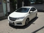 Gia đình cần tiền gấp bán Honda City AT 2015 màu trắng xe rất mới