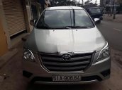 Bán Toyota Innova 2.0E đời 2014, màu bạc