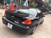 Cần bán lại xe Kia Spectra 1.6 MT sản xuất năm 2003, màu đen như mới, 100 triệu