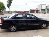 Bán xe Kia Spectra sản xuất 2005, màu đen chính chủ, giá tốt