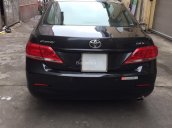 Bán Toyota Camry 2.4G đời 2010, màu đen, 650tr, xe đẹp