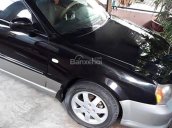 Cần bán Daewoo Magnus 2.5AT đời 2007, màu đen xe gia đình