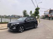 Cần bán gấp Hyundai Tucson 1.6AT năm sản xuất 2018, màu đen, giá 925tr