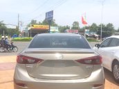 Bán Mazda 3 màu vàng đồng, có tặng bảo hiểm, tư vấn trả góp lãi suất thấp, giao xe tận nhà, LH 0907148849