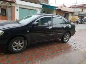 Cần bán xe Toyota Corolla altis đời 2003, màu đen  