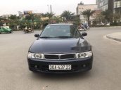 Bán ô tô Mitsubishi Lancer năm 2001, màu đen chính chủ, 135tr