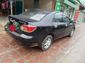 Cần bán xe Toyota Corolla altis đời 2003, màu đen  