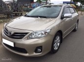 Gia đình cần bán Altis 1.8 MT 2013 số sàn, màu vàng cát zin cọp trùm mền