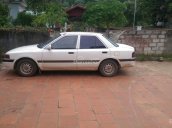 Cần bán Mazda 323 năm sản xuất 1995, màu trắng 