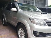 Gia đình bán ô tô Toyota Fortuner sản xuất năm 2013, màu bạc