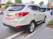 Cần bán xe Hyundai Tucson 2.0 AT 4WD năm 2013, màu vàng, nhập khẩu 