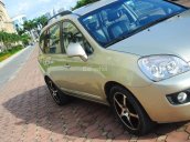 Cần bán Kia Carens 2.0 sx 2009, màu vàng