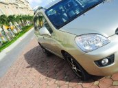 Cần bán Kia Carens 2.0 sx 2009, màu vàng